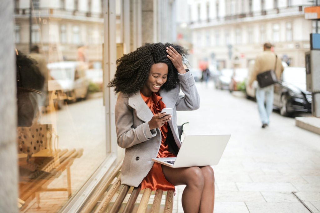 woman explores online shopping experience via laptop 