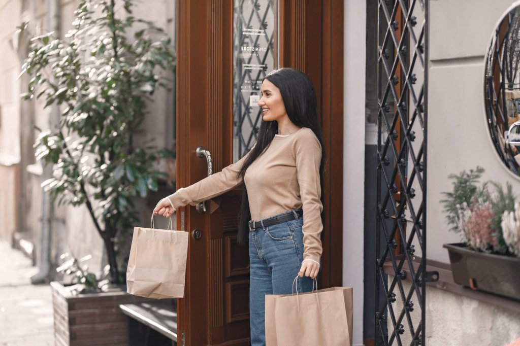 woman shopping with paper bags, recommendation engines