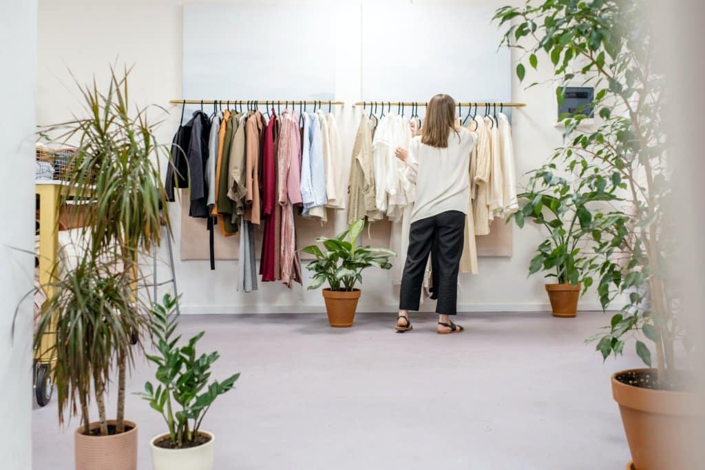 Woman looking at clothing. Product tagging improves online shopping experience.