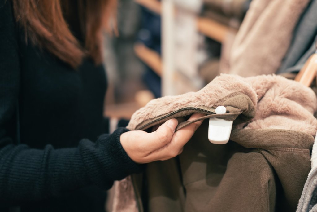 woman checking out clothes, product discovery