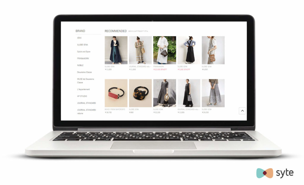 Baycrew's eCommerce product listing page with photos of models in clothing 