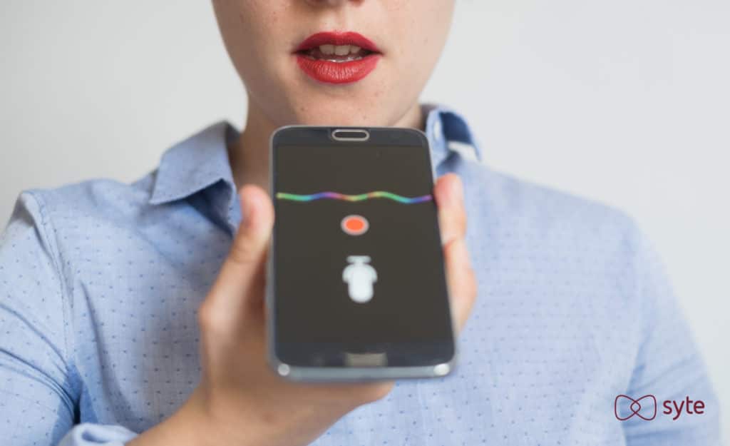 Woman uses voice command technology to place an order on Singles Day. 