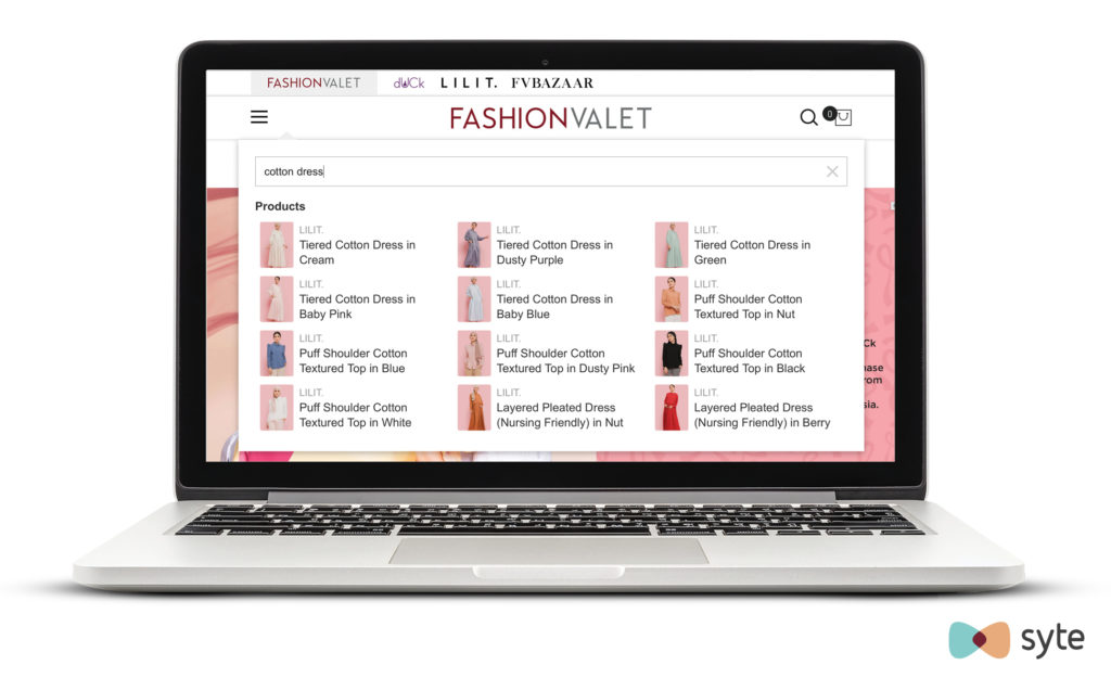 FashionValet suggests a number of different cotton dress options even without the user pressing the enter button to finalize search results.
