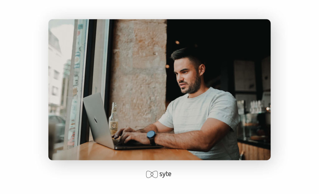 Man looking at his laptop.