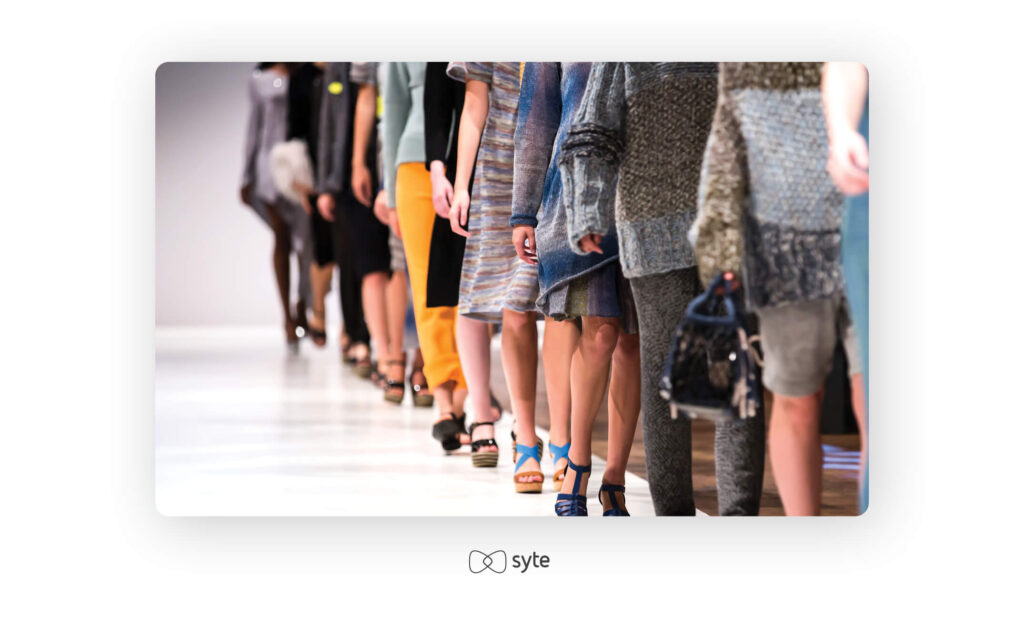 Women lined up on a catwalk